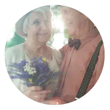 Elderly Couple With Wild Flowers