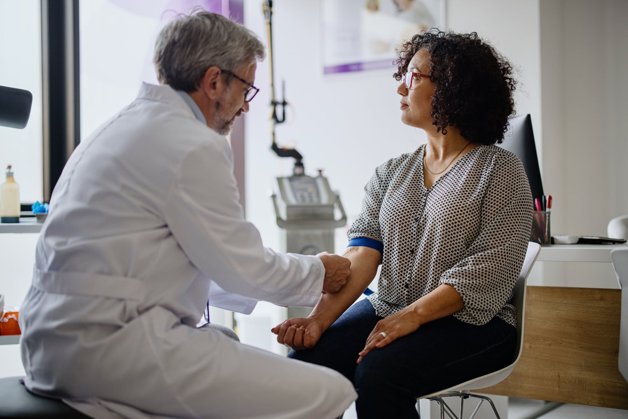 Doctor checking on a research patient