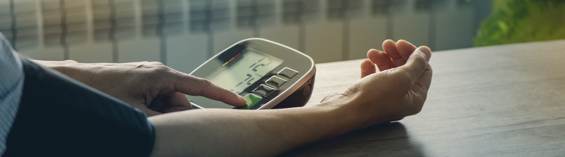 person taking their blood pressure